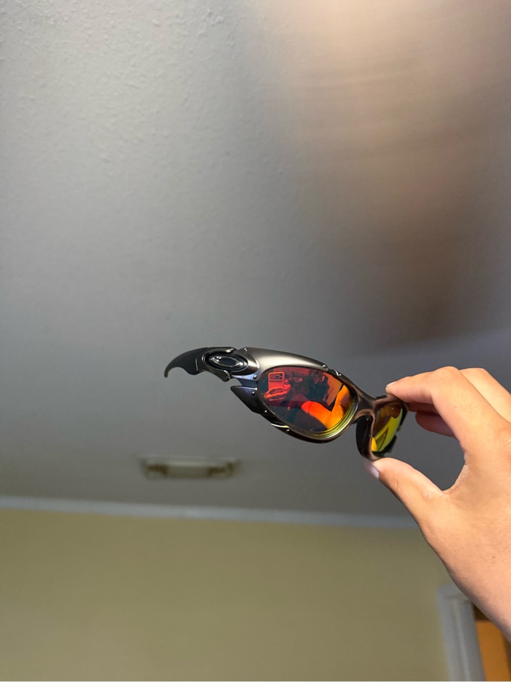 Oakley Men’s Black Frame Sunglasses with Red and Yellow Mirrored Lenses